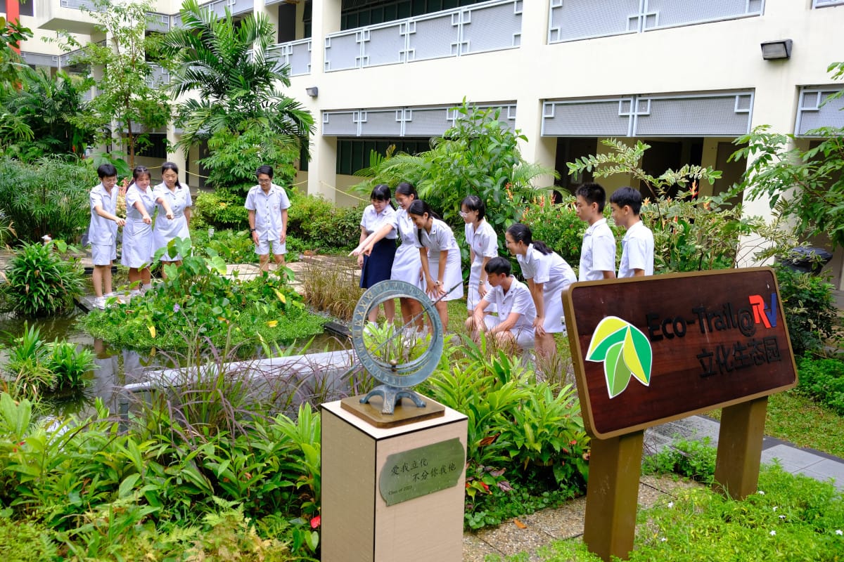 Students exploring the fruit tree garden, ornamental ponds, wetland zone, and mini-rainforest at our Eco-Trail